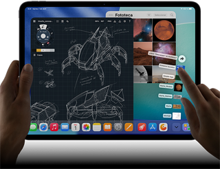 iPad Pro, color negro espacial, la mano izquierda sujeta el dispositivo, la mano derecha usa gestos para manejar varias ventanas de apps abiertas, una app de dibujo con bocetos de diseños mecánicos, una fototeca con imágenes de planetas y el espacio, y la carpeta de descargas con archivos desplegados en abanico
